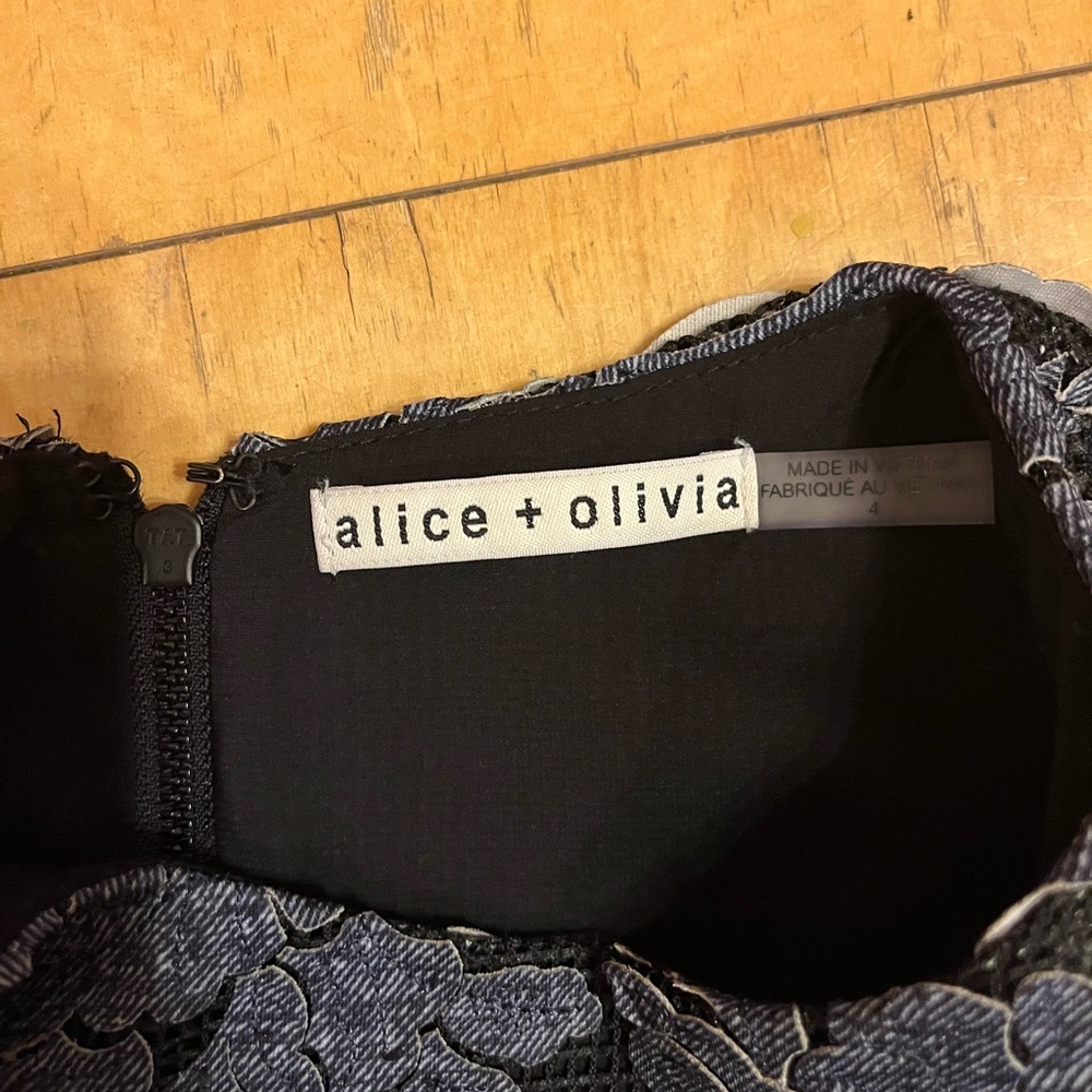 Navy appliqué Alice + Olivia dress. Excellent condition.  Size 4